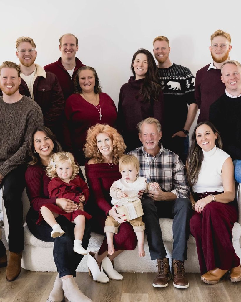 John H. Lill III with his wife Lori, their sons and their families